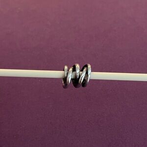 Trollbeads Three Siblings charm. Item # TAGBE-30085.